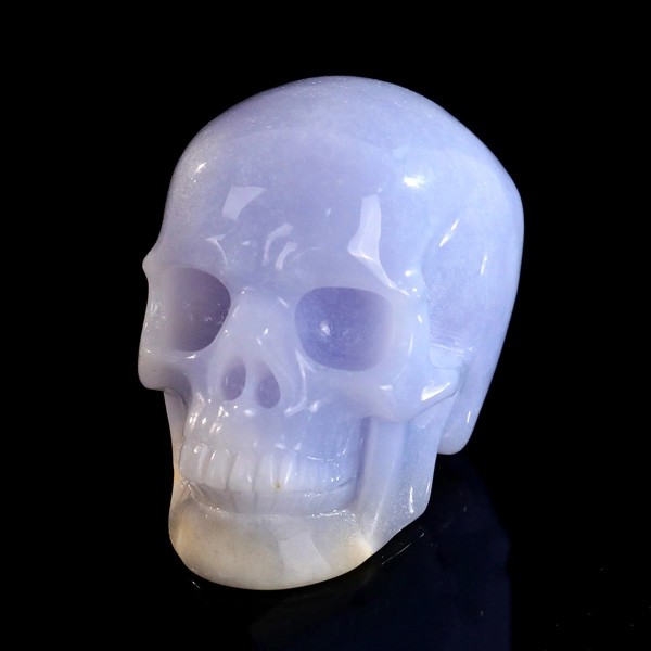 5cm blue chalcedony crystal skull front view white background natural stone polished